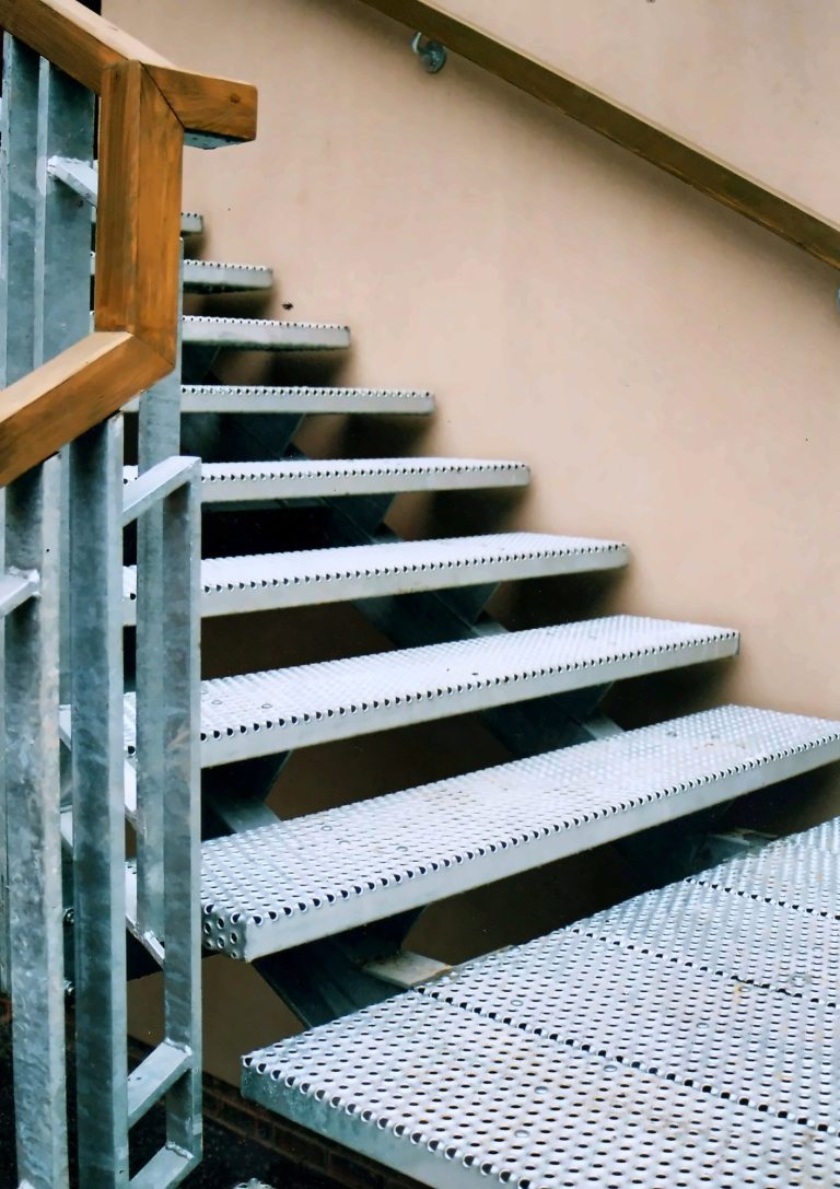External staircase with perforated metal treads