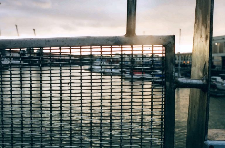 Woven wire mesh balustrade by the harbour