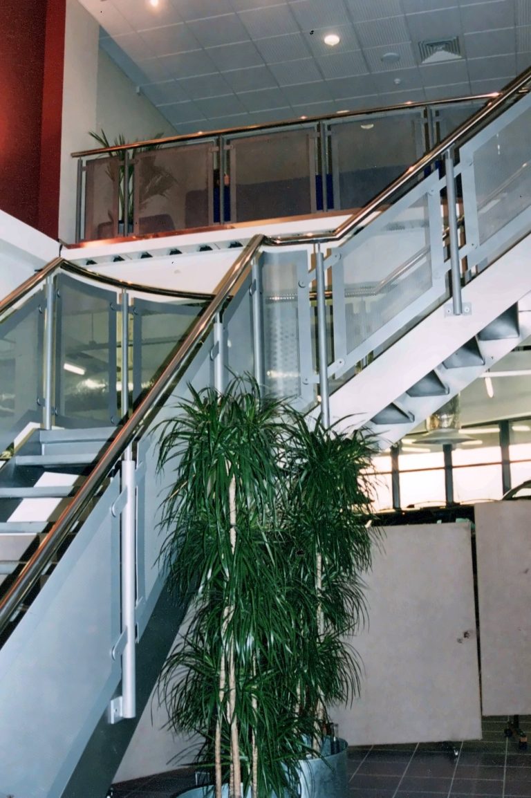 Atrium staircase with mesh balustrade